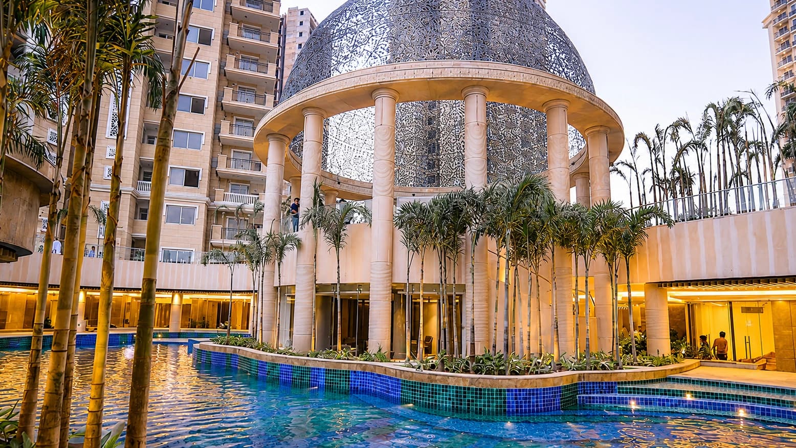 Resort-style swimming pool with luxury residential towers at ACE Golfshire Noida