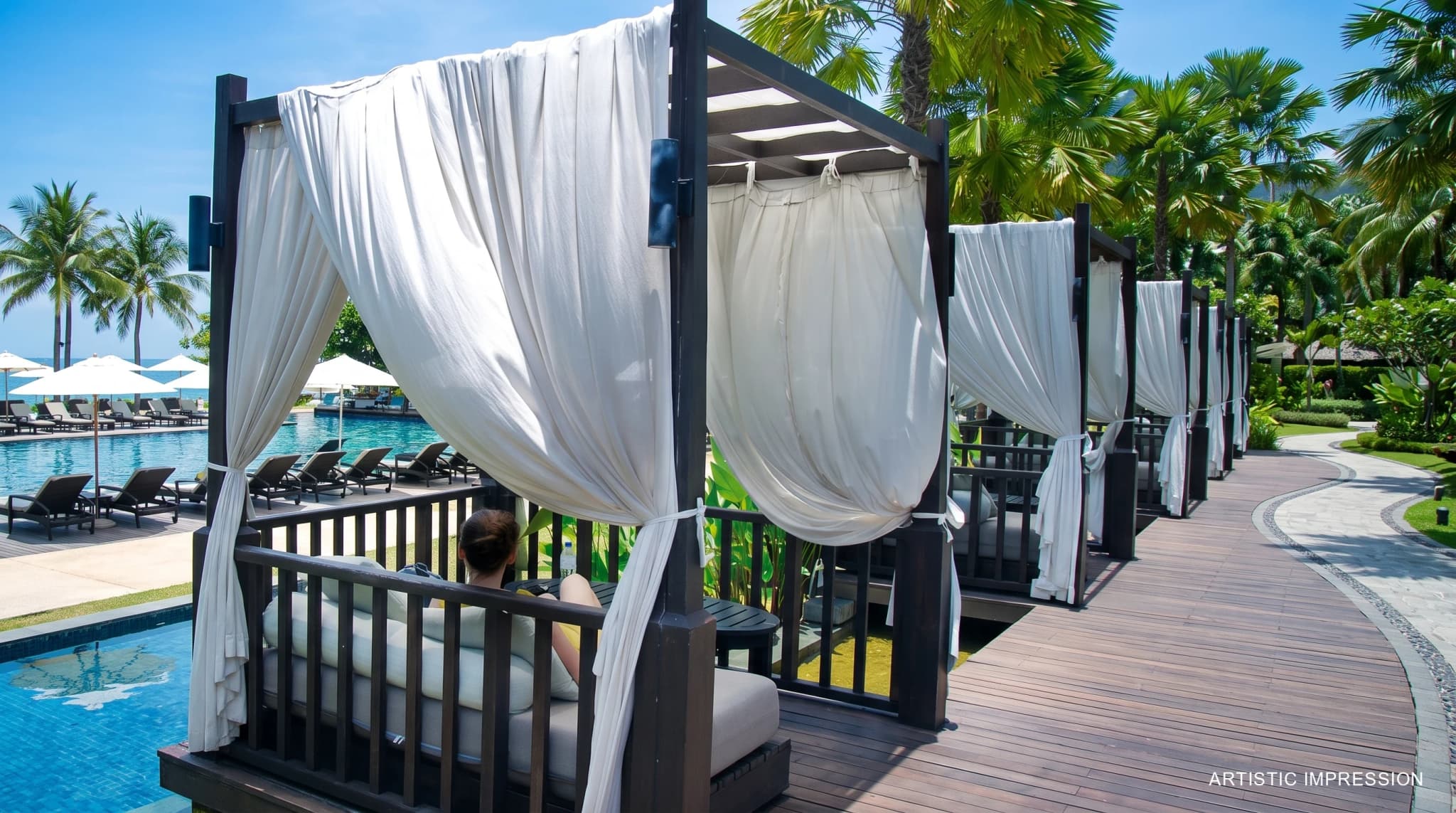 Luxury outdoor amenities and shaded cabana seating surrounded by lush greenery at ATS Pious Orchards