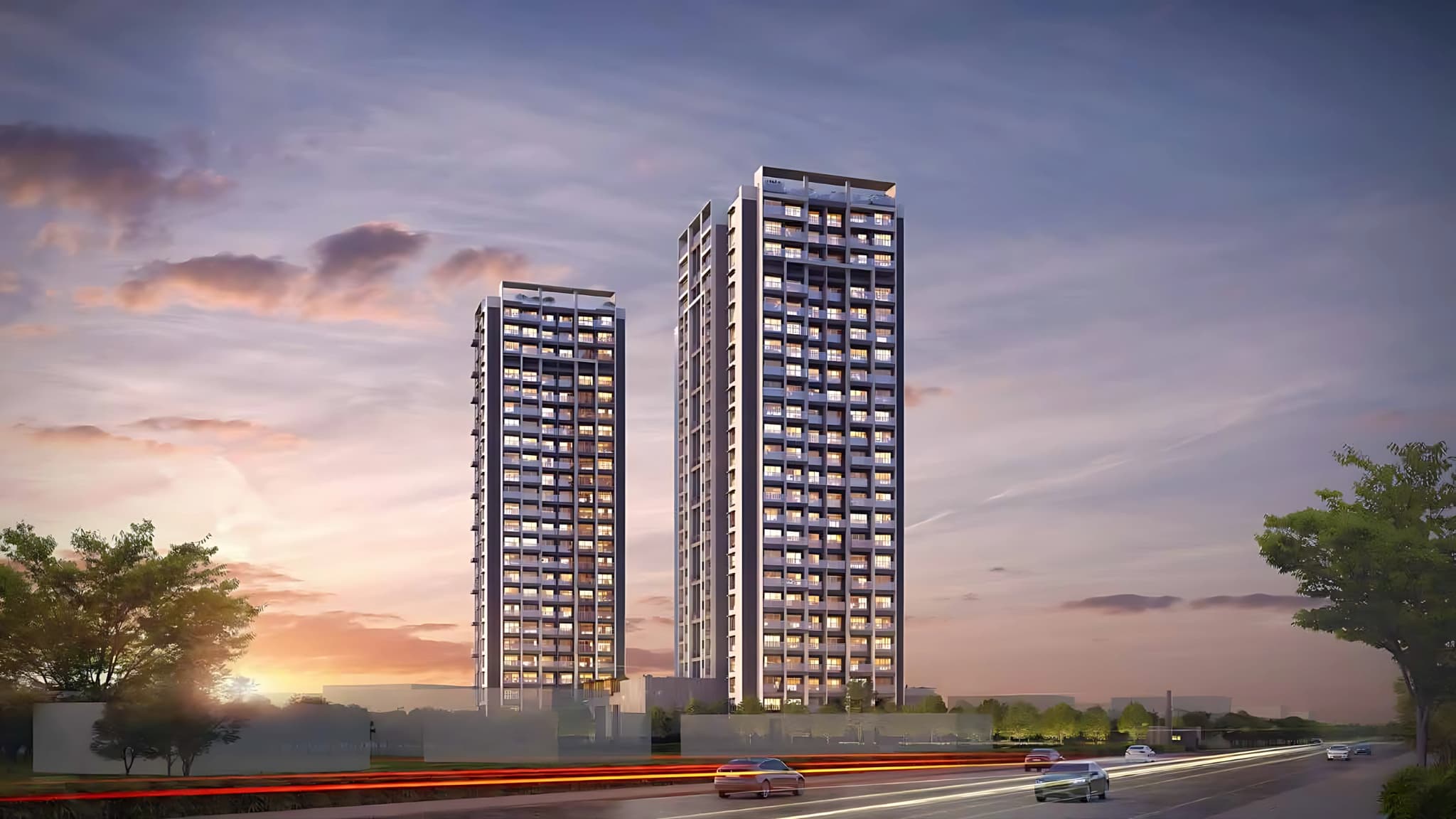 Premium twin residential towers with contemporary architecture and skyline views at sunset