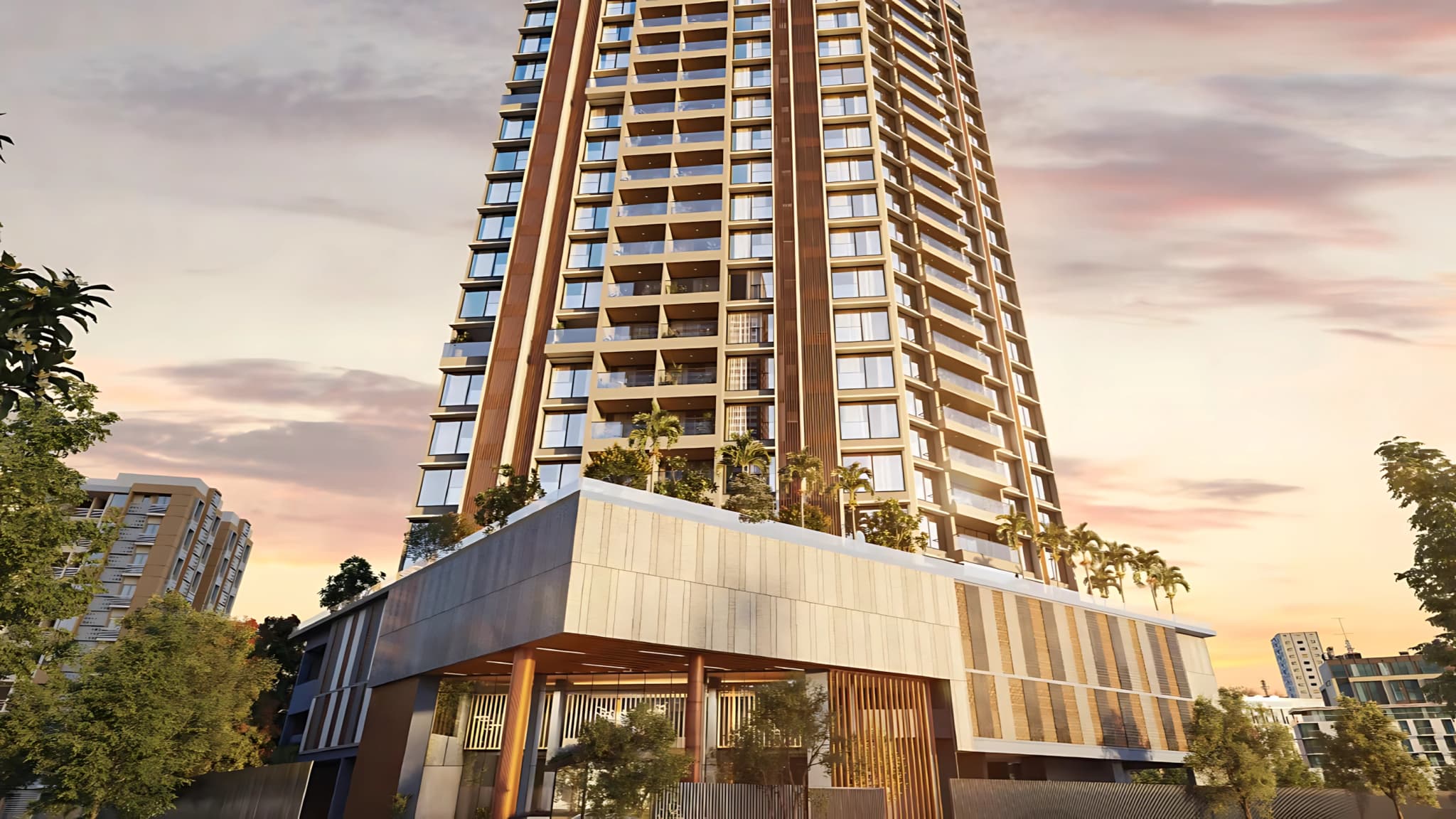 Luxury high-rise residential tower with modern architecture, landscaped podium garden, and premium apartments at sunset in an urban neighborhood