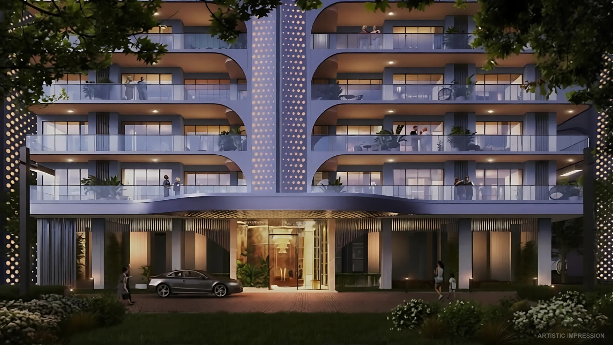 Grand illuminated arrival podium at Smartworld The Edition with porte-cochere and dramatic evening lighting